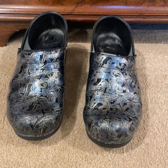 Dansko silver and black flowered clogs